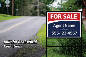 Real estate yard sign installed along a roadside, designed to remain clear and readable in real-world outdoor conditions.