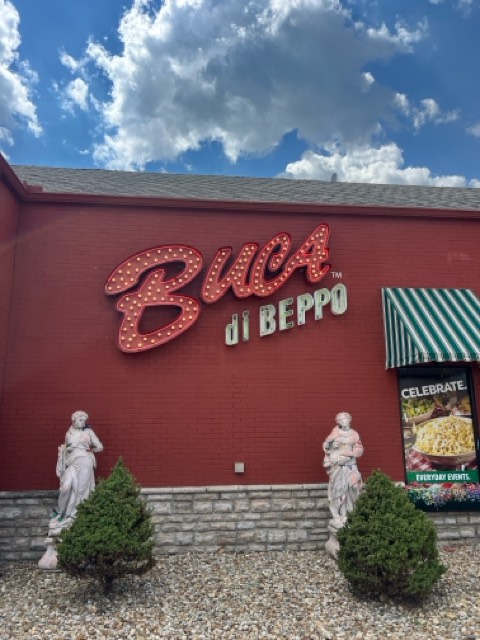 <!-- IMAGE: Small business storefront with clear signage -->