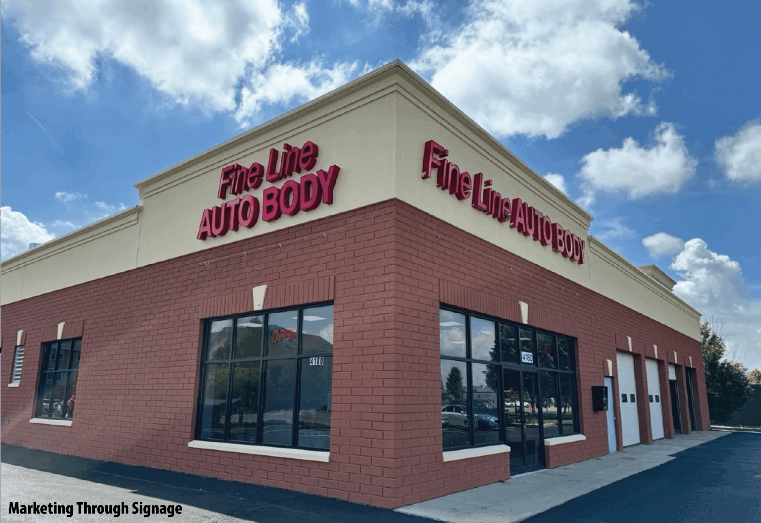 Commercial storefront with bold channel letter signage reading “Fine Line Auto Body” on a corner building, demonstrating effective small business marketing through signage.