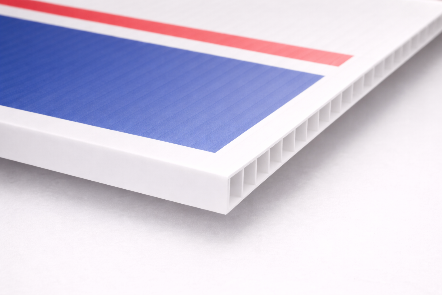 Close-up of corrugated plastic yard sign material showing internal fluted core structure