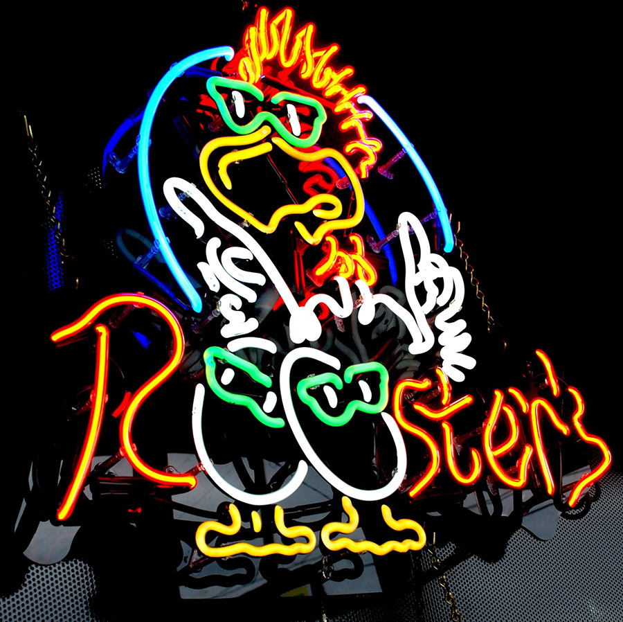 Traditional multicolored neon restaurant sign showing hand-bent illuminated tubing