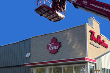 Tim Hortons commercial channel letter sign installation in Columbus Ohio using boom lift equipment.